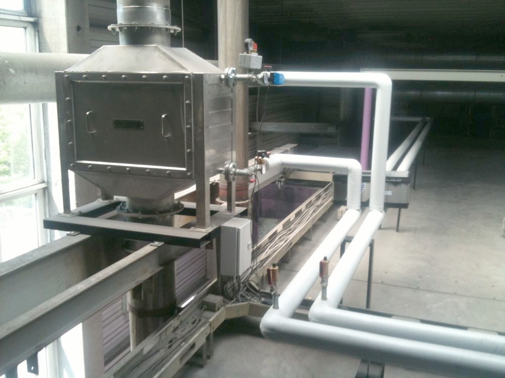 FERCHER exhaust gas heat exchanger mounted above the curing oven